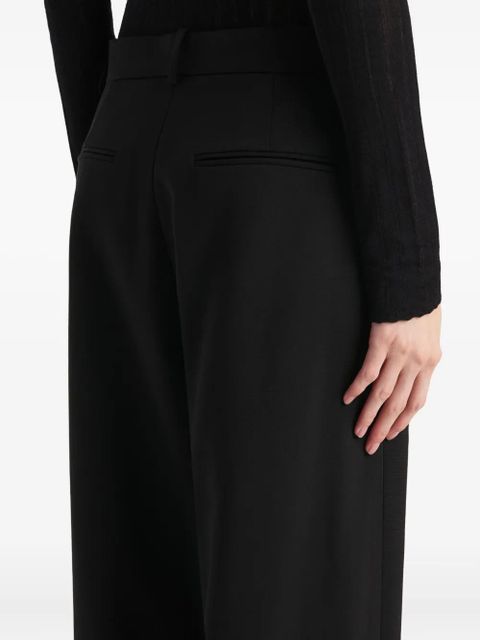KHAITE belt-loops pleated trousers - Black