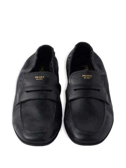 Prada Shuffle antiqued screen-printed-logo loafers - Black