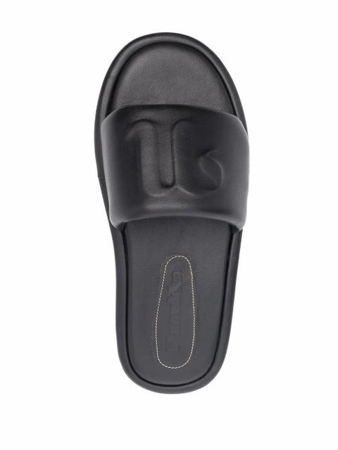 Nanushka logo-embossed leather sandals - Black
