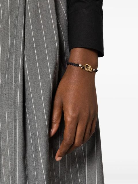 Alexander McQueen Seal-plaque braided-strap bracelet - Black