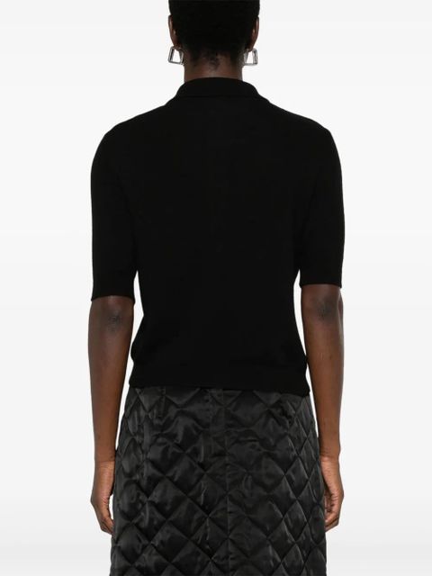 Moschino motif-embroidered polo top - Black