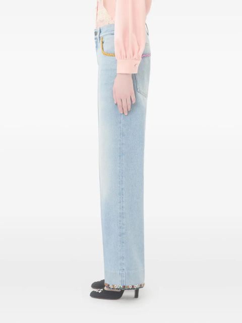 Valentino Garavani floral-hem faded jeans - Blue