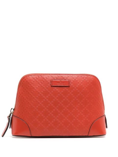 Gucci embossed logo-patch makeup bag - Orange