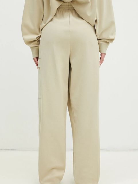 Pangaia spodnie dresowe kolor beżowy gładkie 10002239