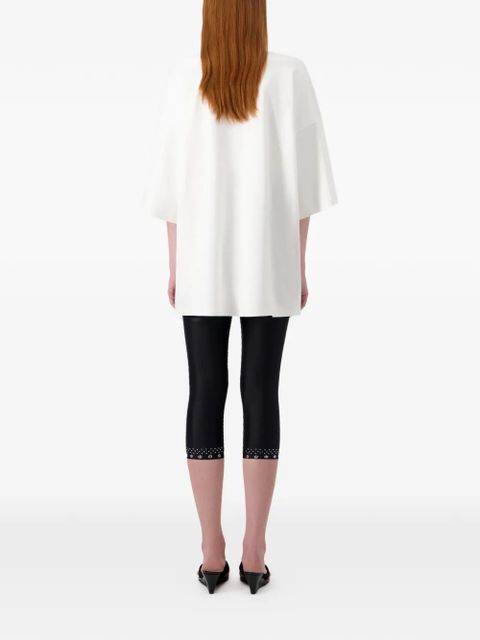 Coperni mantra-print cycling trousers - Black