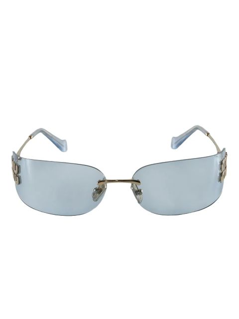 Miu Miu Eyewear logo-plaque rimless sunglasses - Blue