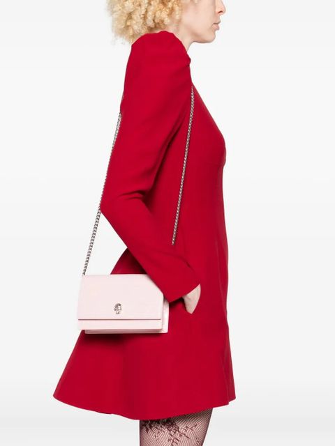 Alexander McQueen skull-embellished crocodile-effect mini bag - Pink