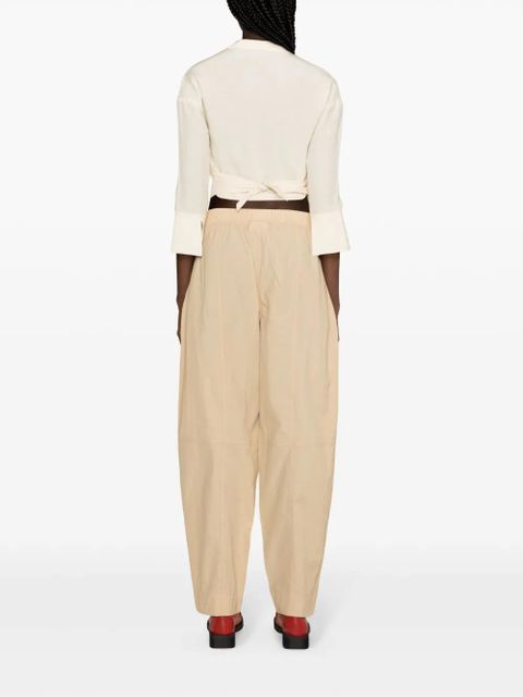 GANNI Curve tapered-leg trousers - Neutrals