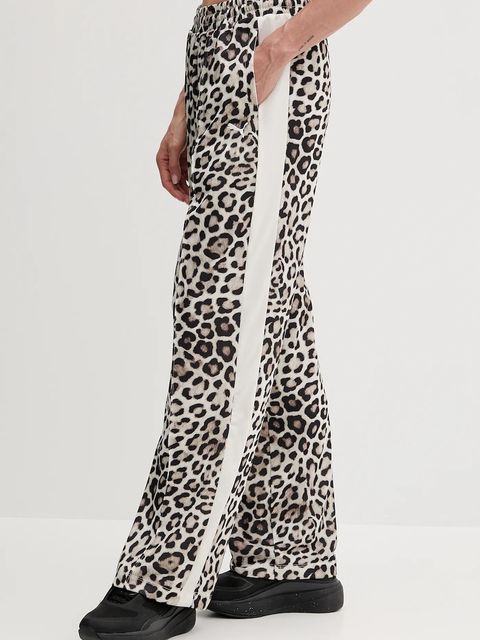 Puma spodnie dresowe damskie kolor beżowy wzorzyste 632343 - zdjęcie produktu nr 1