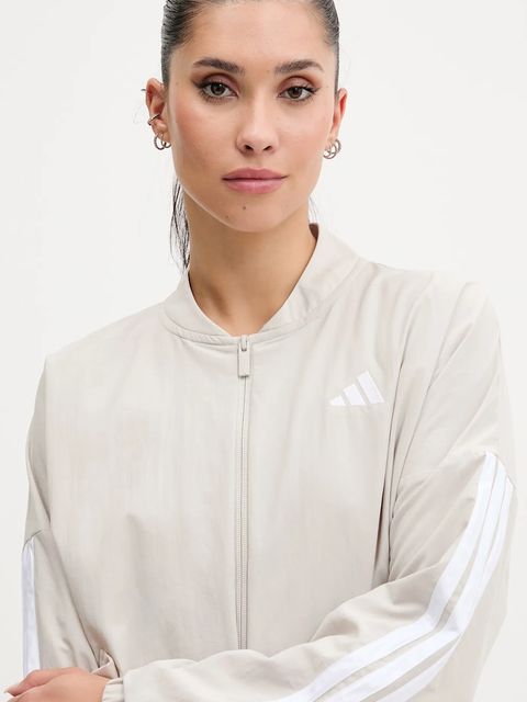 adidas kurtka Essentials kolor beżowy przejściowa oversize JE1317