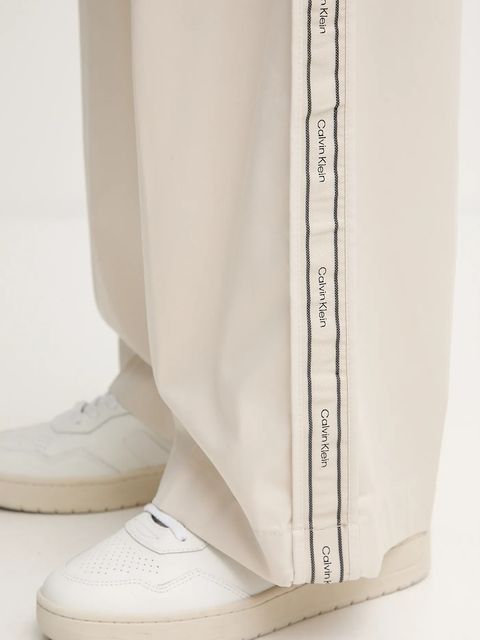 Calvin Klein Jeans spodnie bawełniane damskie kolor beżowy szerokie high waist LV044D612G