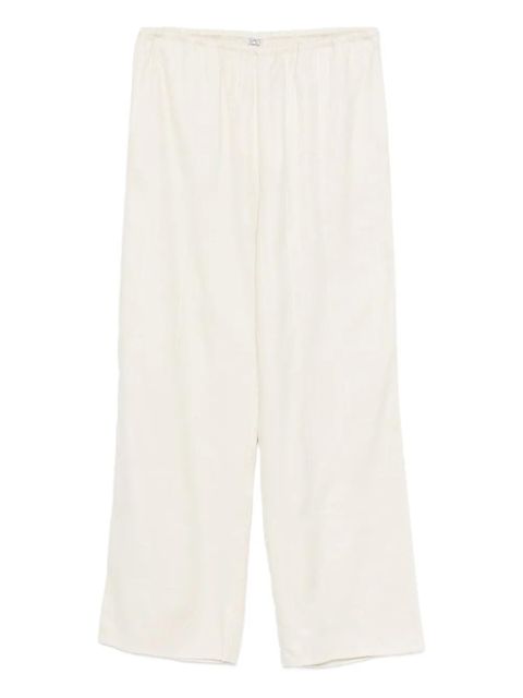 TOTEME monogram-pattern trousers - Neutrals - zdjęcie produktu nr 1