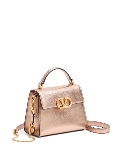 Valentino Garavani Vsling mini handbag in laminated grainy calfskin with jewel logo - Pink