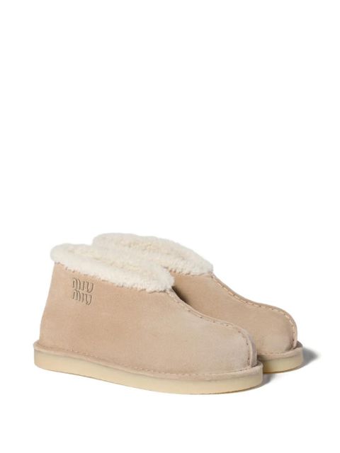 Miu Miu embroidered-logo shearling boots - Neutrals