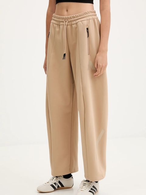 adidas spodnie dresowe Z.N.E. damskie kolor beżowy gładkie JW7770 - zdjęcie produktu nr 1