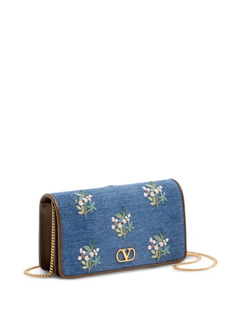 Valentino Garavani Vlogo Signature mini shoulder bag in denim with floral embroidery - Blue