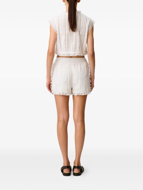 Claudie Pierlot lace-trim pleated shorts - White