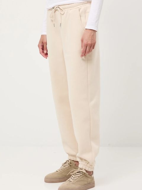 Medicine spodnie dresowe damskie kolor beżowy gładkie
