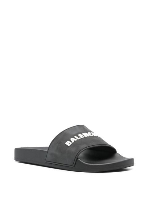 Balenciaga logo-embossed pool slides - Black