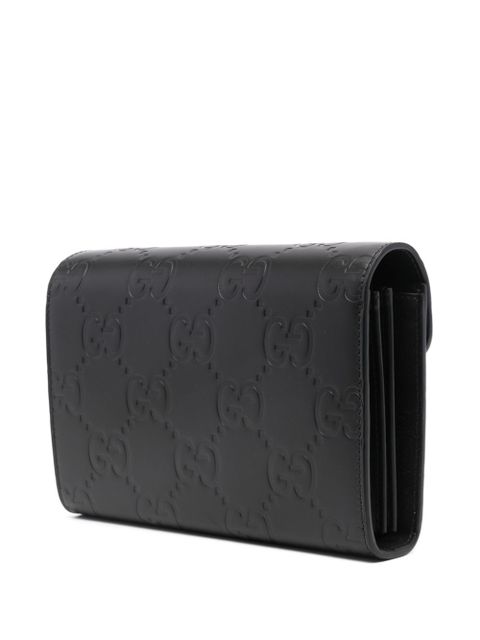Gucci debossed G monogram crossbody bag - Black