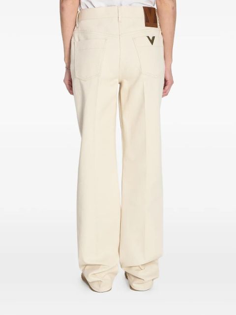 Valentino Garavani pleated gold detail jeans - Neutrals