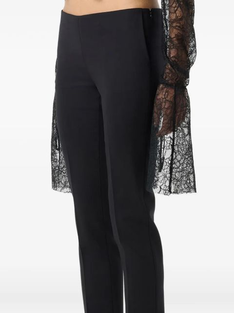 Blumarine flared-hem trousers - Black