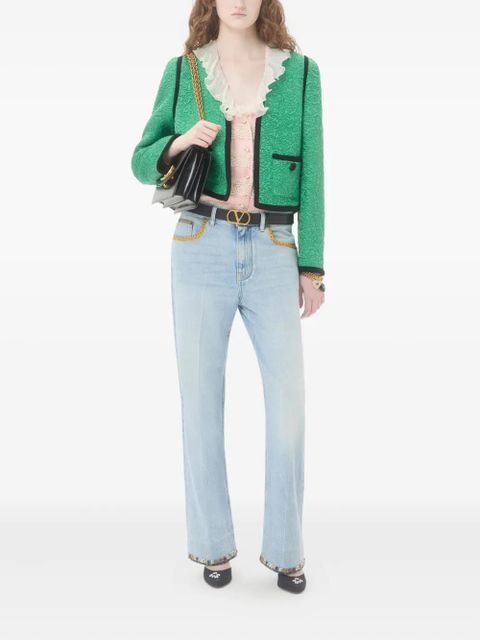 Valentino Garavani floral-hem faded jeans - Blue