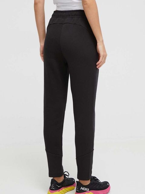 Puma spodnie treningowe Evostripe kolor czarny gładkie