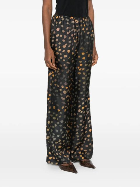 Nanushka elasticated waist dotted trousers - Black