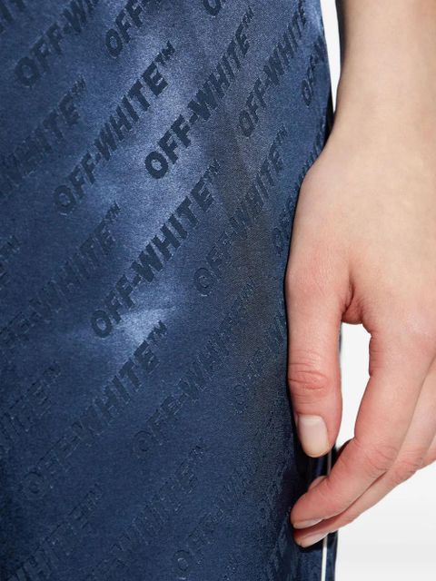 Off-White logo-pattern piped trousers - Blue