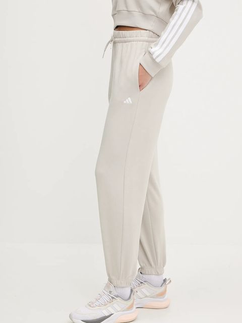 adidas spodnie dresowe Essentials damskie kolor beżowy gładkie JC8305 - zdjęcie produktu nr 1