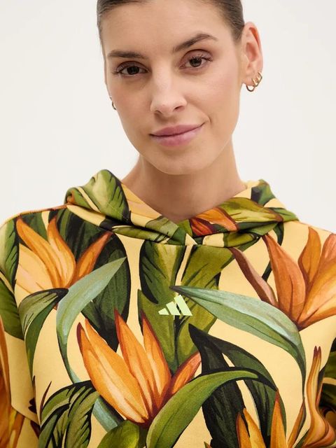 adidas bluza bawełniana x Farm Rio damska kolor żółty z kapturem wzorzysta JD6282