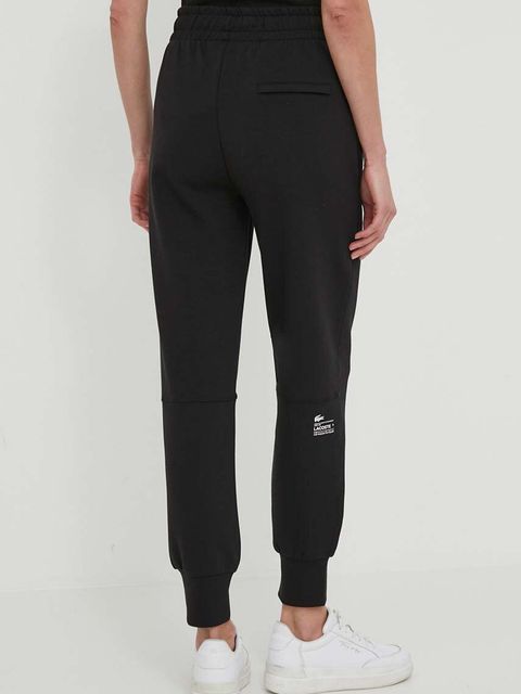Lacoste spodnie dresowe kolor czarny gładkie