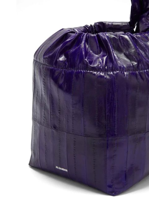 Jil Sander logo-stamp drawstring clutch bag - Purple