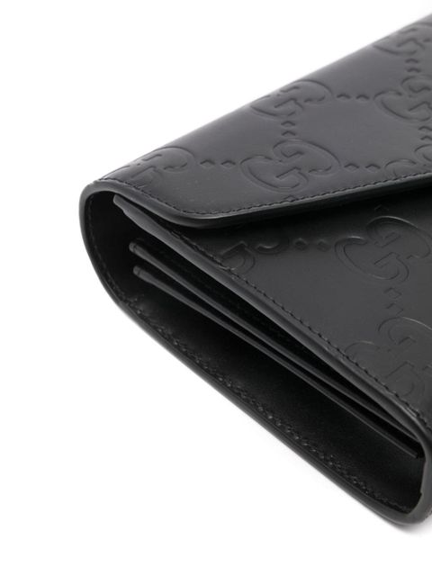 Gucci debossed G monogram crossbody bag - Black