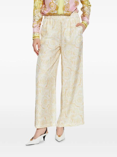Versace floral-patterned trousers - White