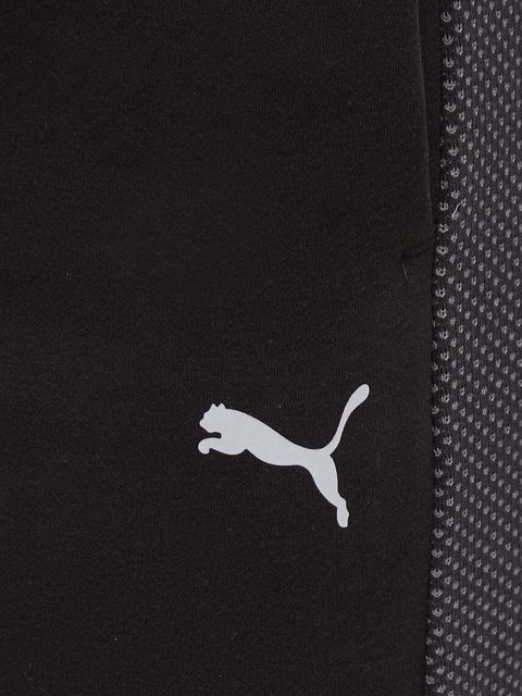 Puma spodnie treningowe Evostripe kolor czarny gładkie