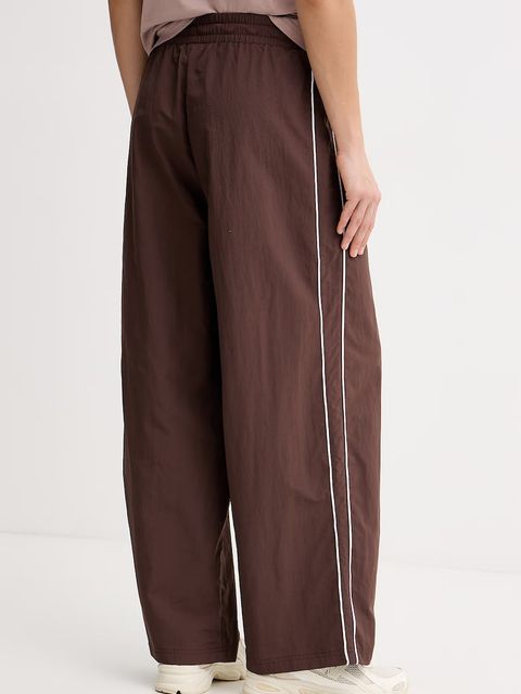 Puma spodnie dresowe Piping Relaxed Woven - zdjęcie produktu nr 2