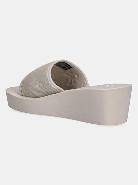 Calvin Klein Jeans klapki BEACH WEDGE SLIDE CANVAS damskie kolor beżowy na koturnie YW0YW01725 - zdjęcie produktu nr 2