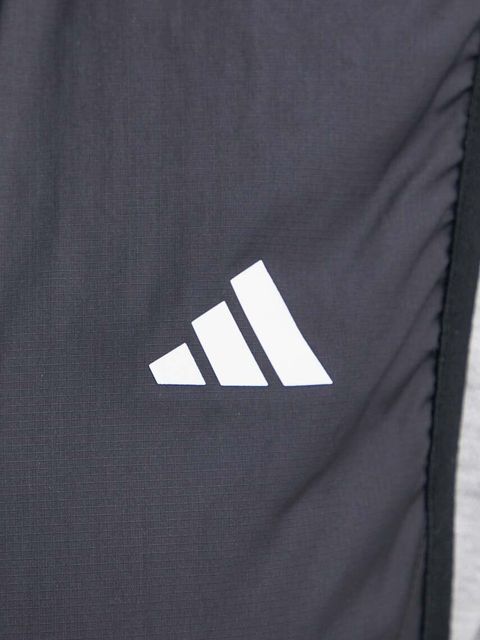 adidas Performance bezrękawnik sportowy Own The Run Base kolor czarny przejściowy IK7446
