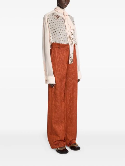 DRIES VAN NOTEN jacquard-swirl trousers - Orange