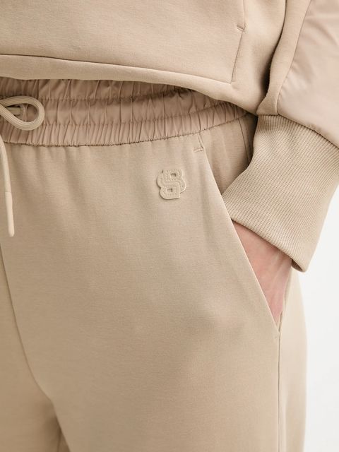 BOSS spodnie dresowe damskie kolor beżowy gładkie 50553665