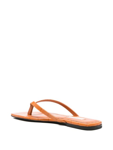 TOTEME croco-embossed flip flops - Orange