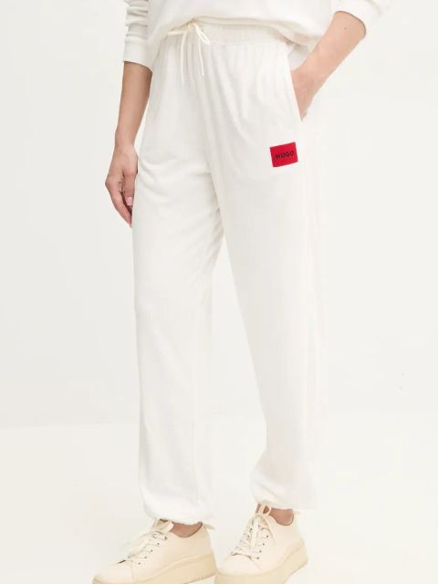 HUGO spodnie lounge damskie kolor beżowy z aplikacją 50531692