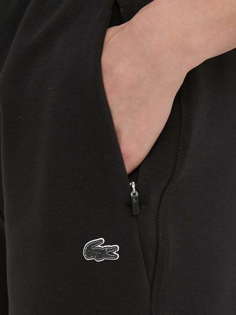 Lacoste spodnie dresowe kolor czarny gładkie
