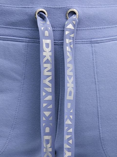 Dkny spodnie dresowe kolor niebieski gładkie DP6P3496