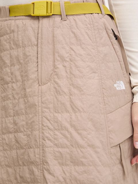 The North Face spódnica Quilted Volume kolor beżowy midi rozkloszowana NF0A8E7BBOX1