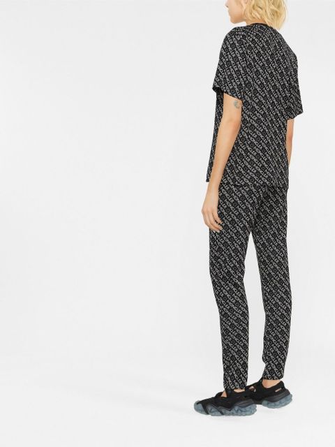 Moncler logo-print jersey trousers - Black