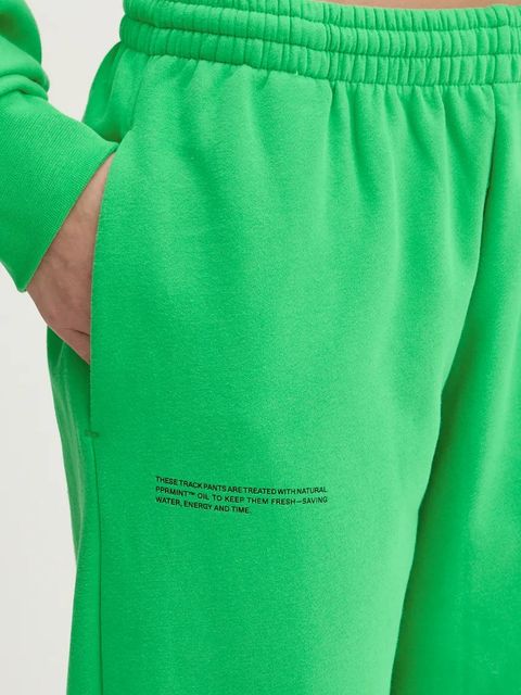 Pangaia spodnie dresowe bawełniane kolor zielony gładkie