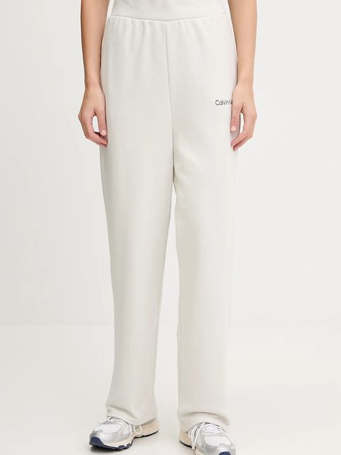 Calvin Klein Performance spodnie dresowe damskie kolor beżowy gładkie LVGWF5P627 - zdjęcie produktu nr 1